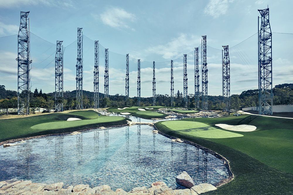Pittsburgh Synthetic grass golf course with water and tall metal towers