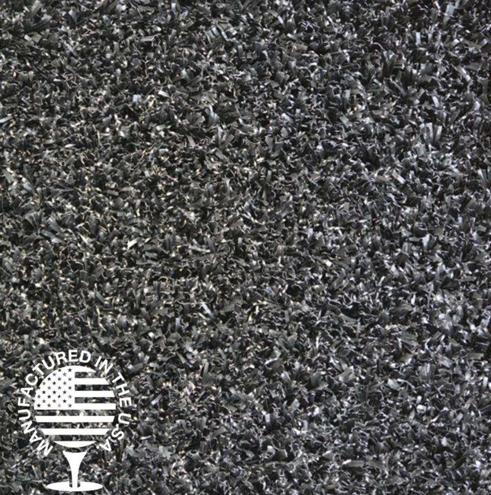 Close-up of premium black artificial turf, manufactured in the USA, featuring durable fibers ideal for playgrounds and custom landscape designs by Southwest Greens. Close-up of premium black artificial turf, manufactured in the USA, featuring durable fibers ideal for playgrounds and custom landscape designs by Southwest Greens.